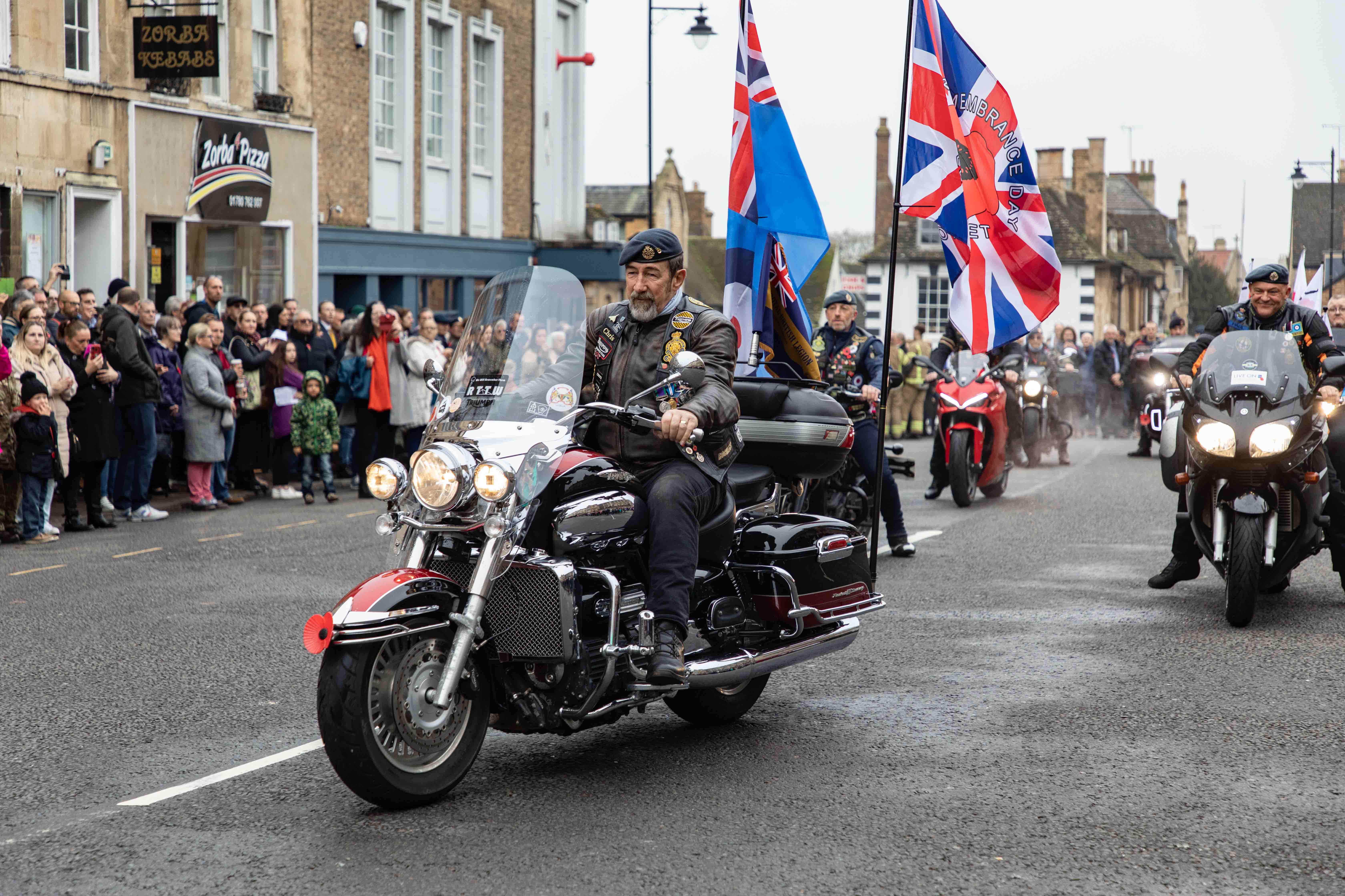Veteran motorcyclists ride through Broad Street in Stamford on Remembrance Sunday